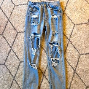 Ripped denim jeans. Size MEDIUM (fits like size 2)